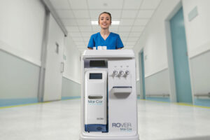Nurse Pushing Portable Dialysis System